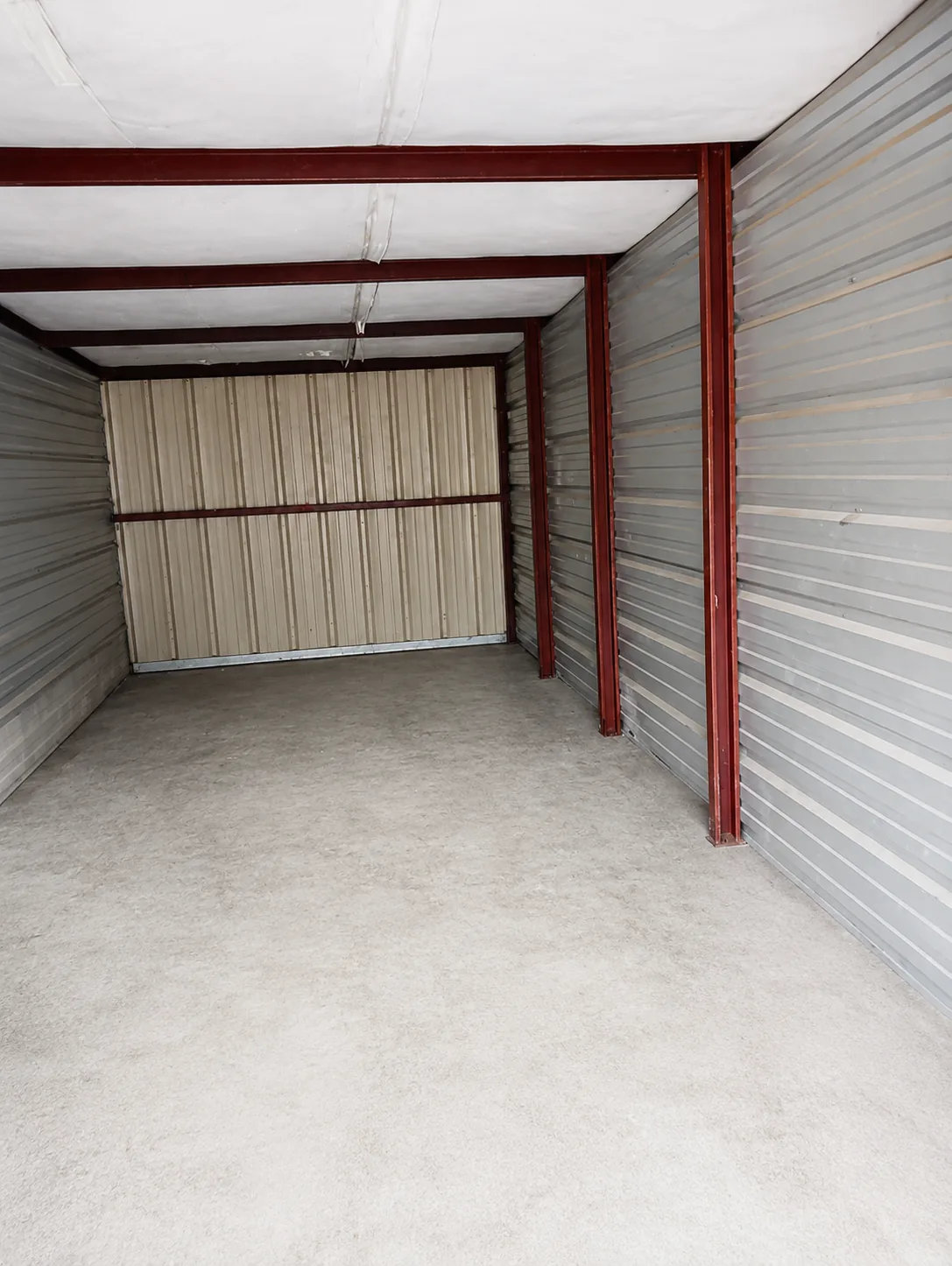 Clean empty 10x25 drive-up storage unit interior at Savy Space Self Storage